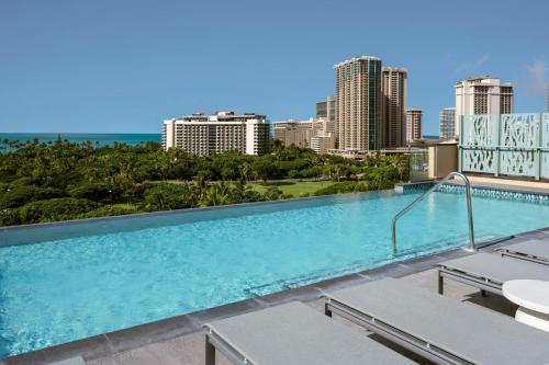a swimming pool with a view of the city at Marriott Vacation Club, Waikiki in Honolulu
