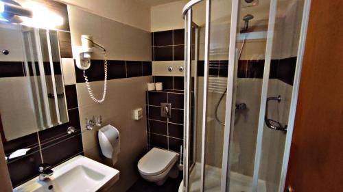 Kúpeľňa v ubytovaní Átrium Hotel Harkány