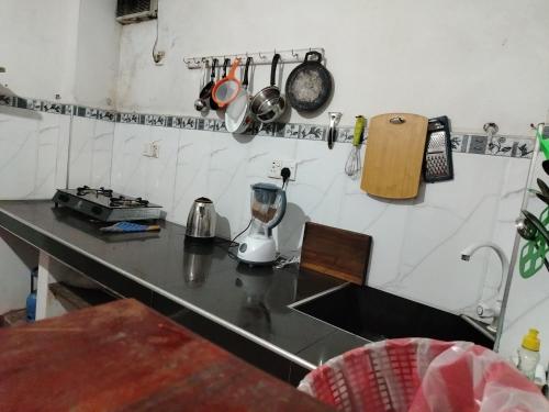 a kitchen with a counter with a blender on it at New mom house in Tangalle