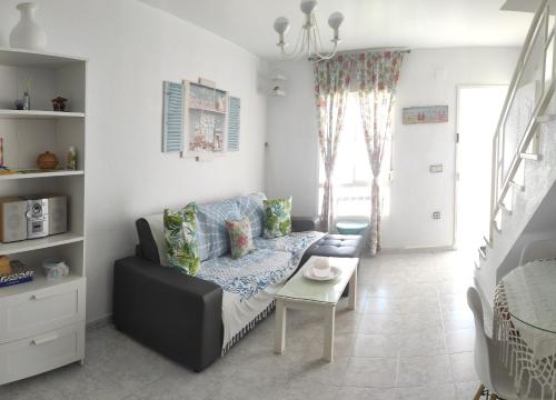 Posezení v ubytování Islantilla adosado piscina, parking 1 minuto al mar
