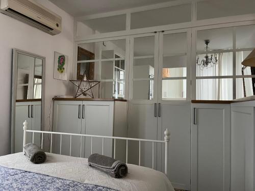 Кровать или кровати в номере La Casita Boutique San Andrés