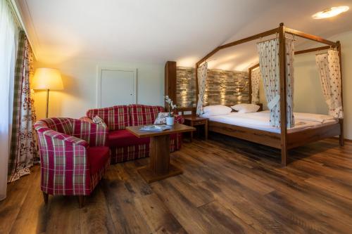 Ένα ή περισσότερα κρεβάτια σε δωμάτιο στο Sackmann Wanderhotel