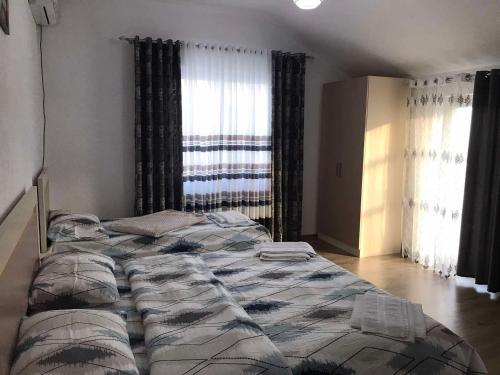 Postel nebo postele na pokoji v ubytování Villa Rejan