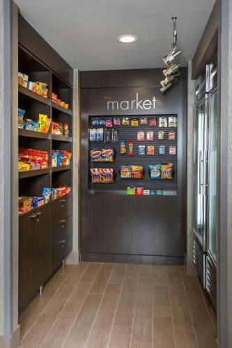 a walk in pantry with a display of food at Residence Inn by Marriott Bloomington by Mall of America in Bloomington