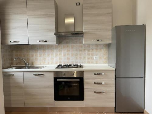 Kuchyň nebo kuchyňský kout v ubytování Villa Orchidea