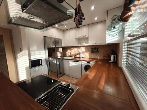 Кухня или мини-кухня в 2 izbový štýlový a útulný apartmán
