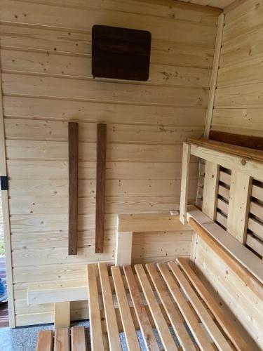 an inside of a sauna with wooden walls at +Authentic+ in Mariánské Lázně