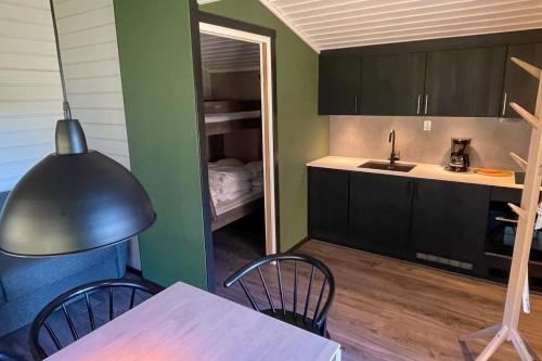 Kuchyň nebo kuchyňský kout v ubytování Mellbystrands Camping