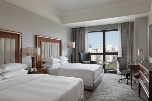 Postel nebo postele na pokoji v ubytování Istanbul Marriott Hotel Asia