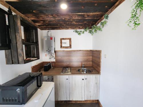 Chalet de la Comtéにあるキッチンまたは簡易キッチン