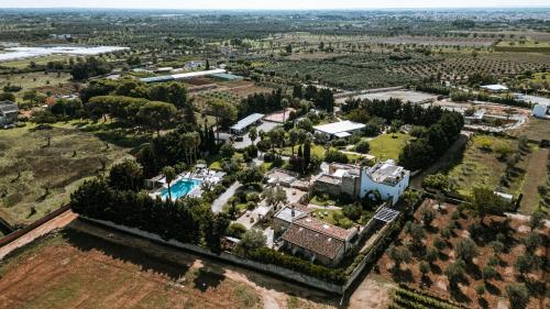 an aerial view of a large estate with a pool at Masseria La Tofala benessere & SPA in Copertino