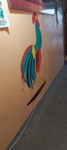 a painting of a rooster on the side of a wall at Basildon House of Muralist in Basildon