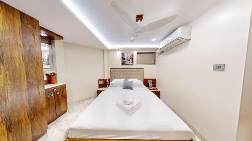 Ένα ή περισσότερα κρεβάτια σε δωμάτιο στο Al Barakah 5 BHK Private Swimming Pool Villa