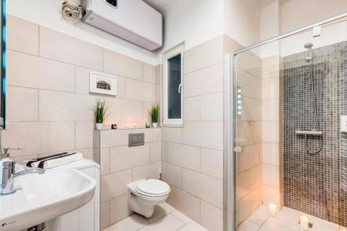 Kúpeľňa v ubytovaní Real Apartments Kertész II.