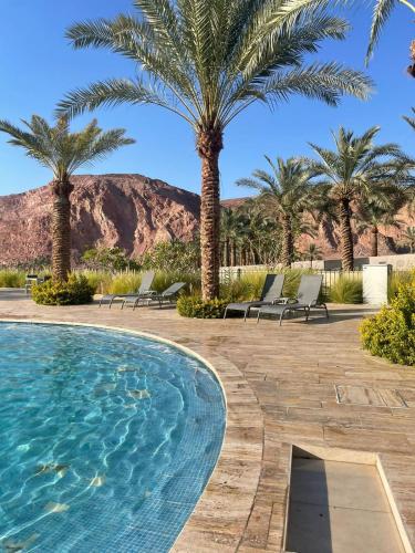 Πισίνα στο ή κοντά στο Alraha VIP Marsa zayed Aqaba