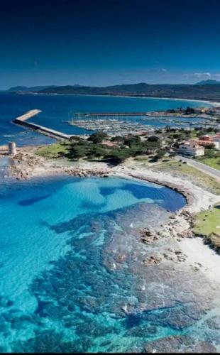 an aerial view of an island in the water at Kevin ' s house in Posada