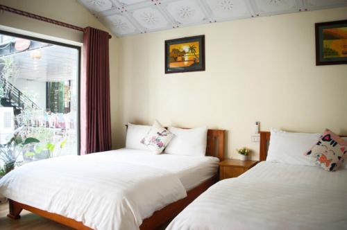 Katil atau katil-katil dalam bilik di Sparrow's Song Homestay
