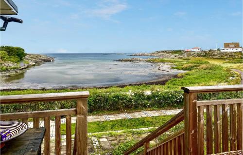 a view of the ocean from a deck at 3 Bedroom Awesome Home In Vallda in Vallda
