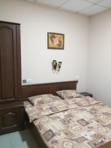 Postel nebo postele na pokoji v ubytování Sherlock Hotel
