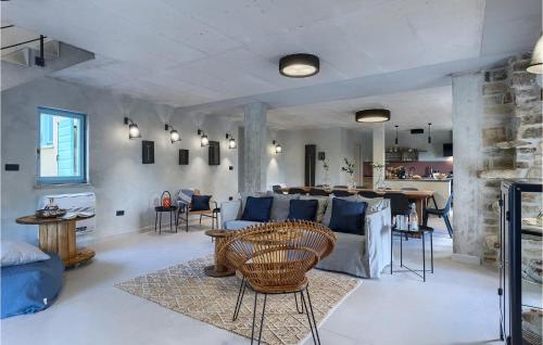 a living room with a couch and a table at Villa Casa Jovanin in Motovun