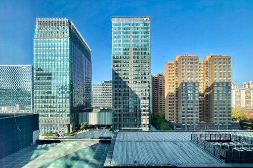 a view of a city skyline with tall buildings at Chengdu Marriott Hotel Financial Centre in Chengdu