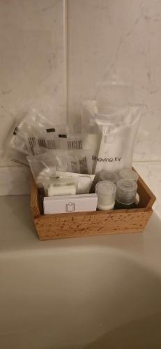 a wooden tray filled with items on a table at Matzuri Nekazal Turismoa in Mutriku