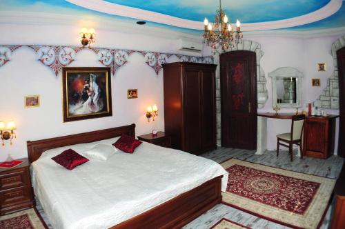 Postel nebo postele na pokoji v ubytování Hotel Villa Classica