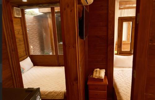 Postel nebo postele na pokoji v ubytování Hoàng Dung homestay- Vũng Tàu