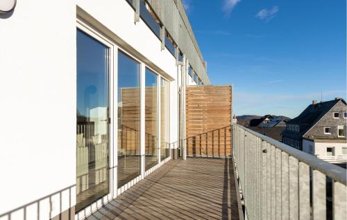 a balcony with a view of a building at Gebirgsresort Winterberg in Winterberg
