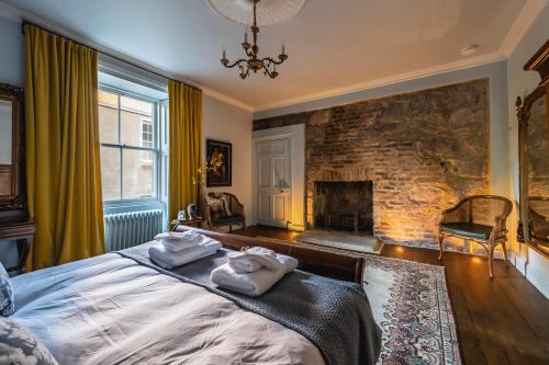 Ένα ή περισσότερα κρεβάτια σε δωμάτιο στο Burnhervie House