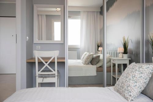 Postel nebo postele na pokoji v ubytování Apartamenty Deluxe