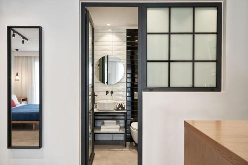 Katil atau katil-katil dalam bilik di Cozy Suites Potos