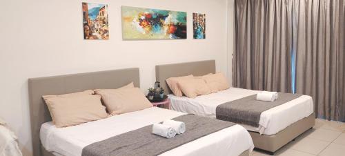 Postel nebo postele na pokoji v ubytování Midhills Mist & Bloom Y5tvbox AIRCOND Genting Highland