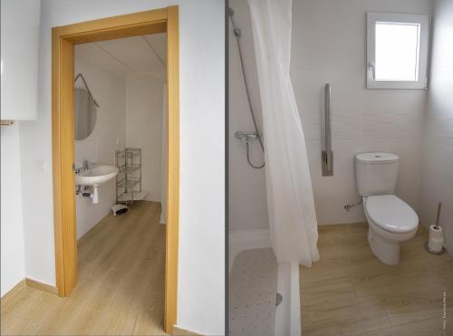a bathroom with a toilet and a sink at Casa Rural Chache CASTO in Bienservida