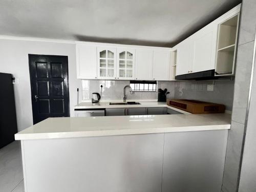 Η κουζίνα ή μικρή κουζίνα στο Melz Apartments