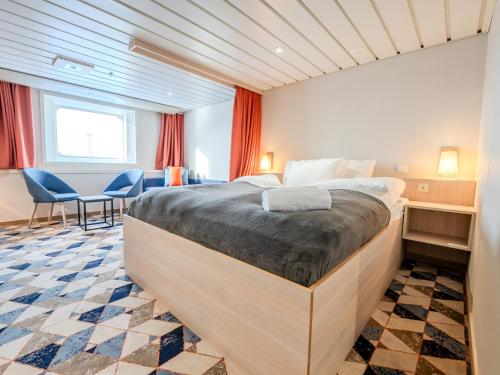 Ένα ή περισσότερα κρεβάτια σε δωμάτιο στο DFDS Mini Cruise "Newcastle - Amsterdam - Newcastle"