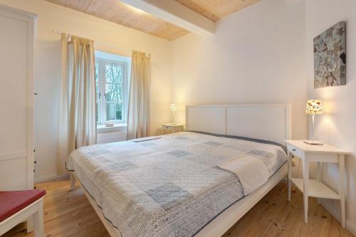 Ένα ή περισσότερα κρεβάτια σε δωμάτιο στο Haus Mühlenhof 2