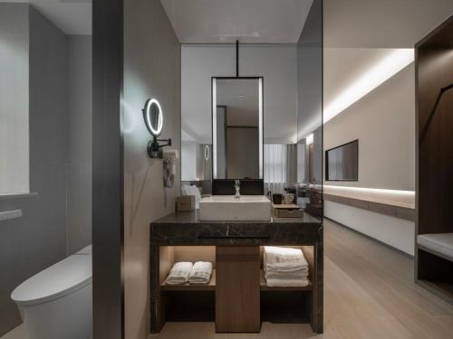 Koupelna v ubytování Walling Hotel - Chongqing hongyadong jialingjiang binjianglu
