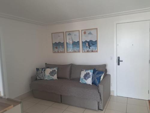 Χώρος καθιστικού στο Apartamento completo na Praia da Costa com vista para o mar