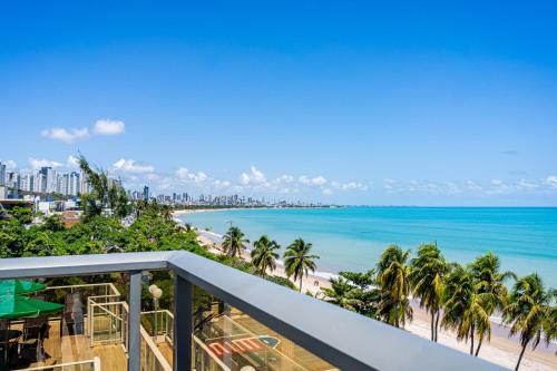 a view of the beach from a balcony at Icon Hotel by Welkom in João Pessoa