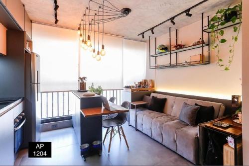 Χώρος καθιστικού στο Studio 1204 Com Vista Livre e Andar Alto