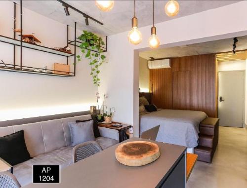 Χώρος καθιστικού στο Studio 1204 Com Vista Livre e Andar Alto