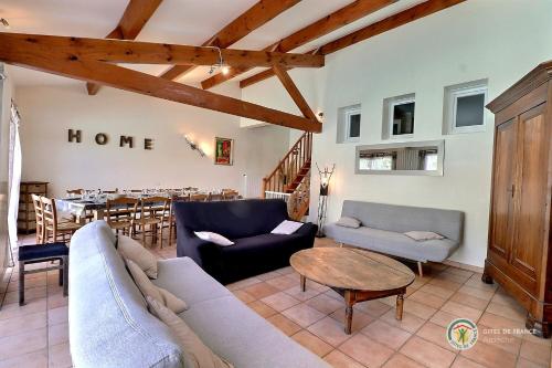 Χώρος καθιστικού στο GRAND GîTE MARIE-THE