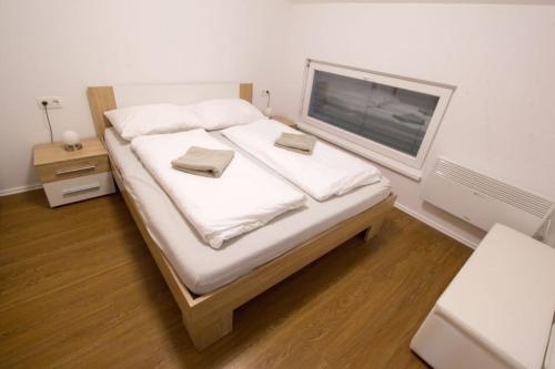 Postel nebo postele na pokoji v ubytování Apartments Mak