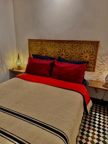 Ένα ή περισσότερα κρεβάτια σε δωμάτιο στο Appartement khmissa
