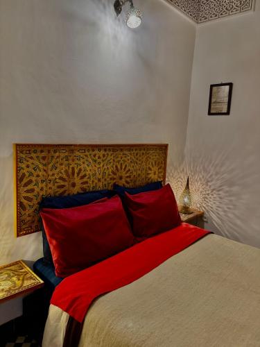 Ένα ή περισσότερα κρεβάτια σε δωμάτιο στο Appartement khmissa