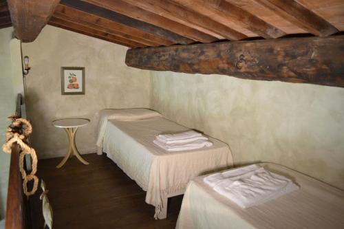 Ένα ή περισσότερα κρεβάτια σε δωμάτιο στο Appartamento Il Fienile Del Sole, Wifi, Perugia