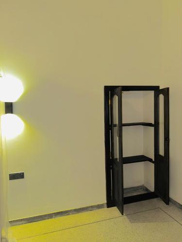 Ένα ή περισσότερα κρεβάτια σε δωμάτιο στο Paradise cove Apartment