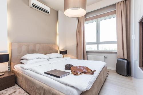 Ένα ή περισσότερα κρεβάτια σε δωμάτιο στο Platinum Residence