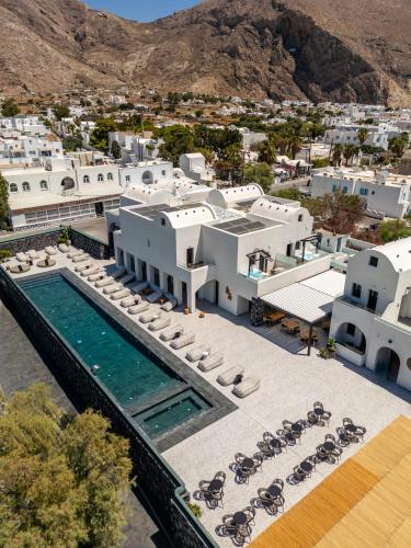 an aerial view of a villa with a swimming pool at Santo Mangata Boutique Hotel and Spa in Perissa